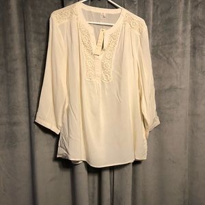 Ivory blouse with crochet neckline